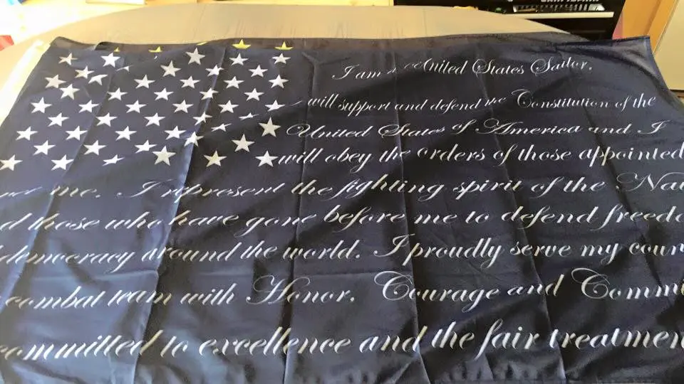 US flag with text about service and honor.