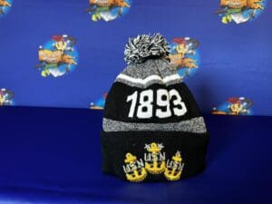 A black and white hat with the number 1 8 9 3 on it.