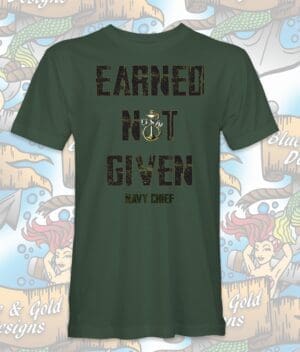 Green T-shirt with "Earned Not Given" text.